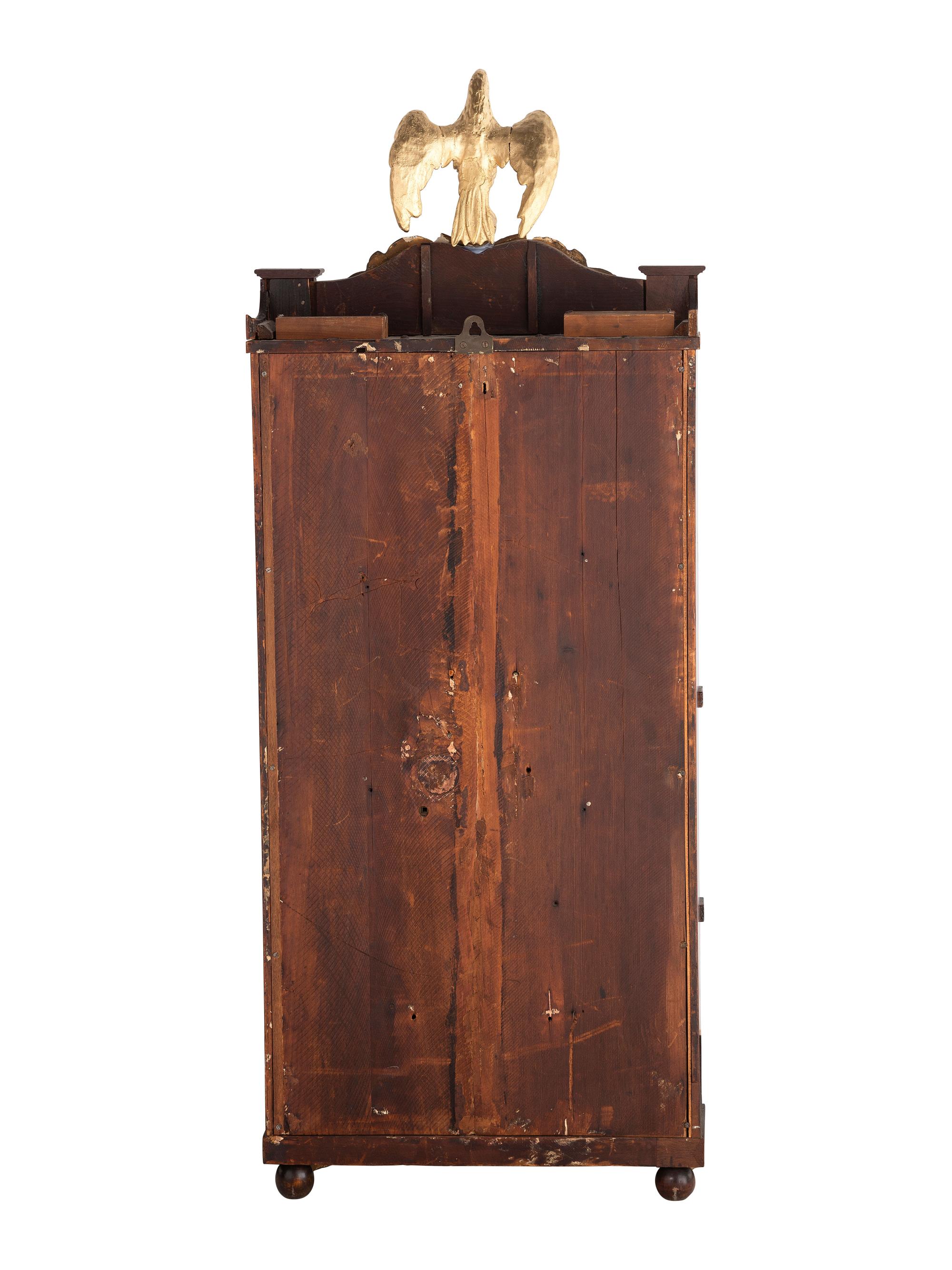 A Mahogany Eglomise and Parcel Gilt Mantel Clock