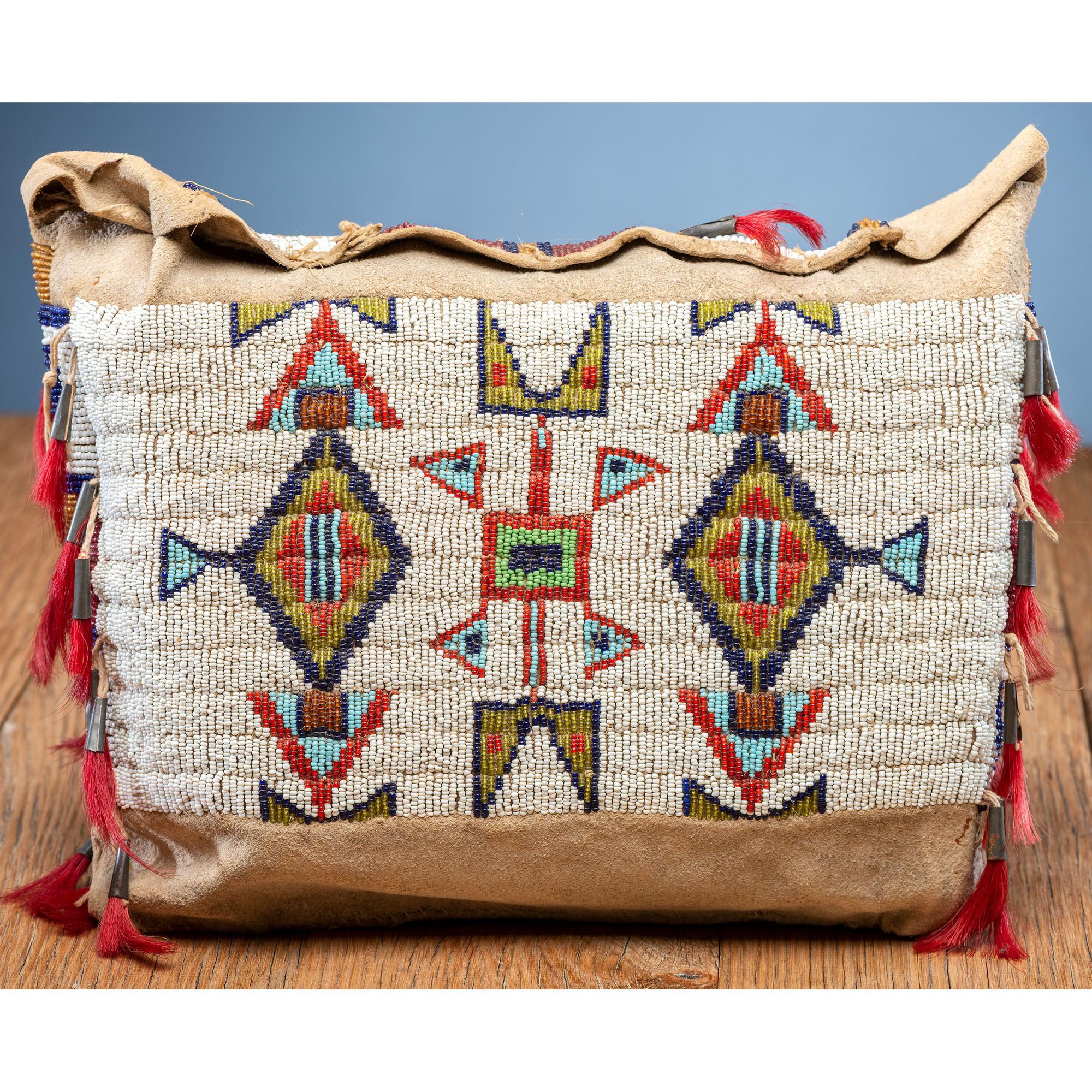 Sioux Child's Beaded Buffalo Hide Possible Bags, Matched Pair