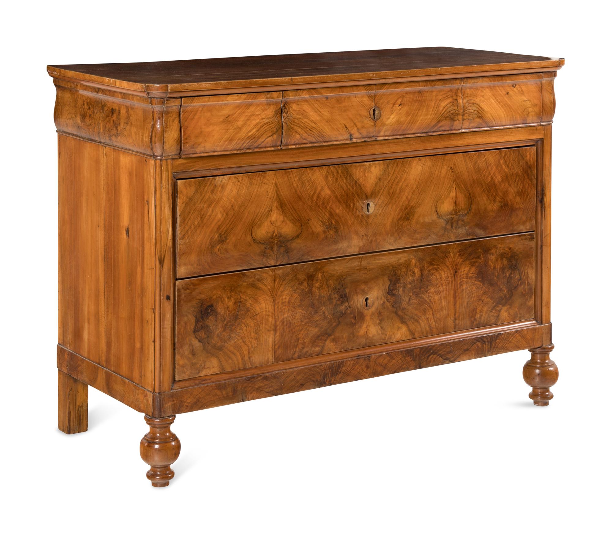 An Italian Walnut Chest of Drawers