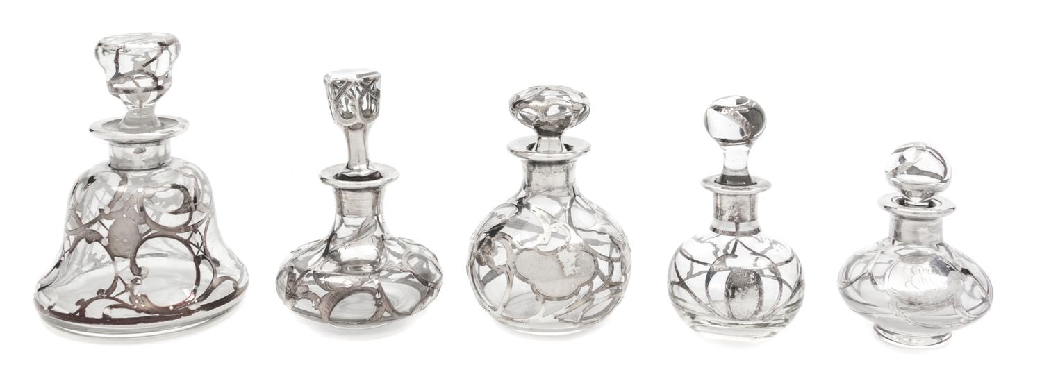 A Group of Five Silver Overlay Glass Perfume Bottles Height of tallest 4 3/4 inches.