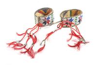 Pair of Plains Beaded Arm Bands Height 2 x diameter 4 inches — Early 20th Century