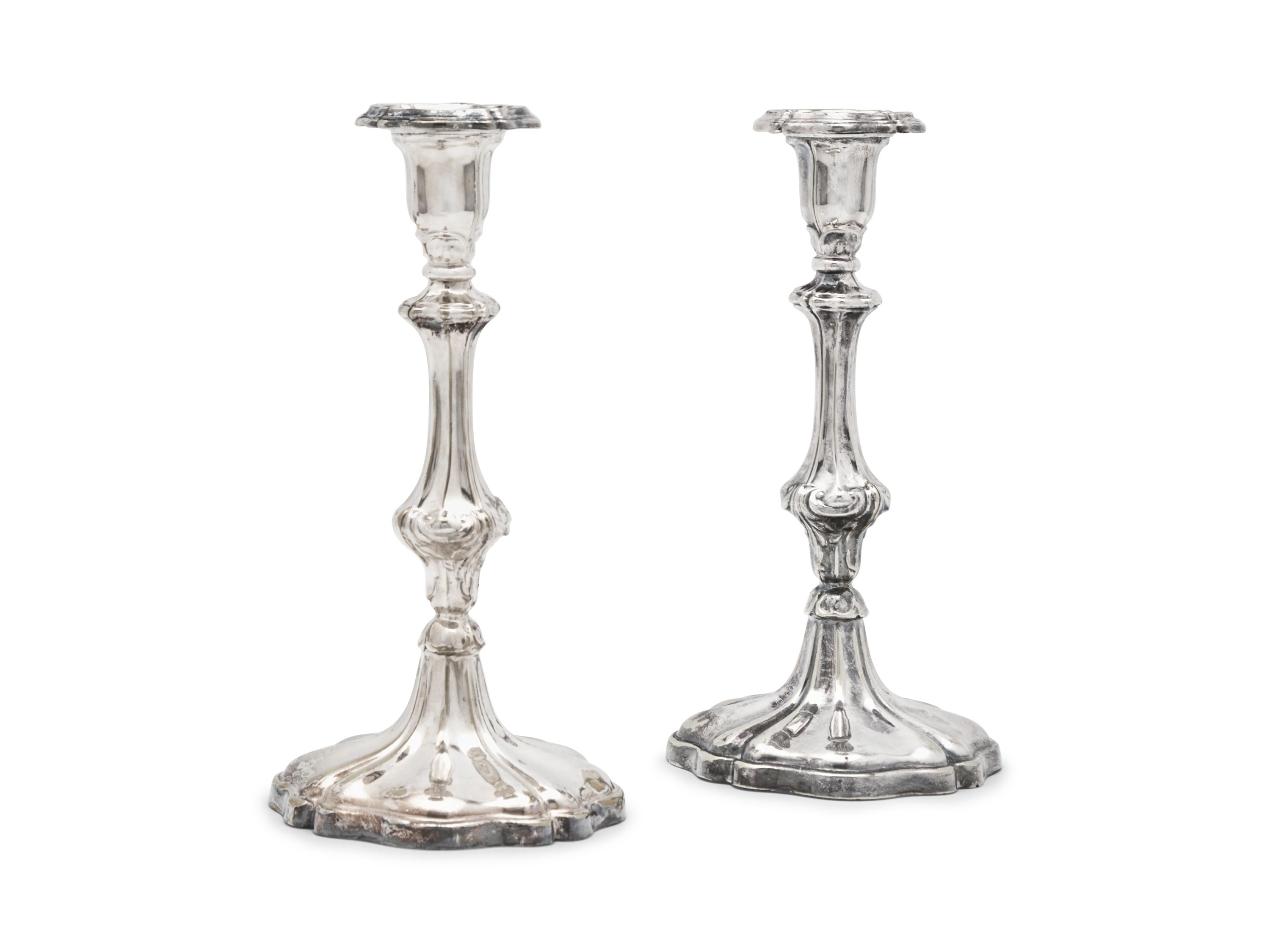 A Pair of Sheffield Plate Candlesticks