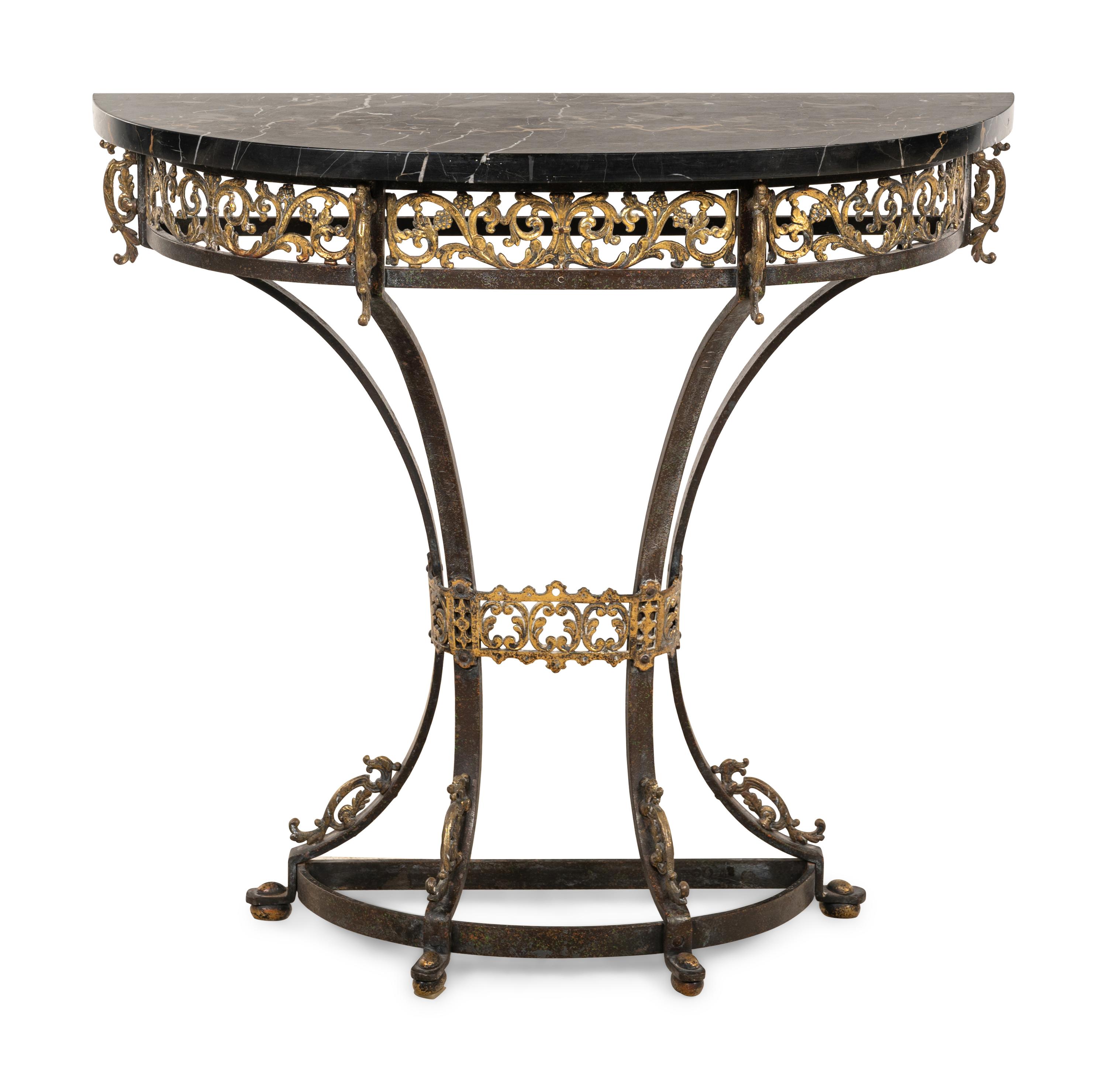 A Continental Ebonized and Parcel Gilt Metal Marble-Top Console Table and Mirror