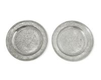 A Matched Pair of French Wriggle-Work Engraved Pewter Chargers, by M. Chocquell, Bergues, France, Circa 1750