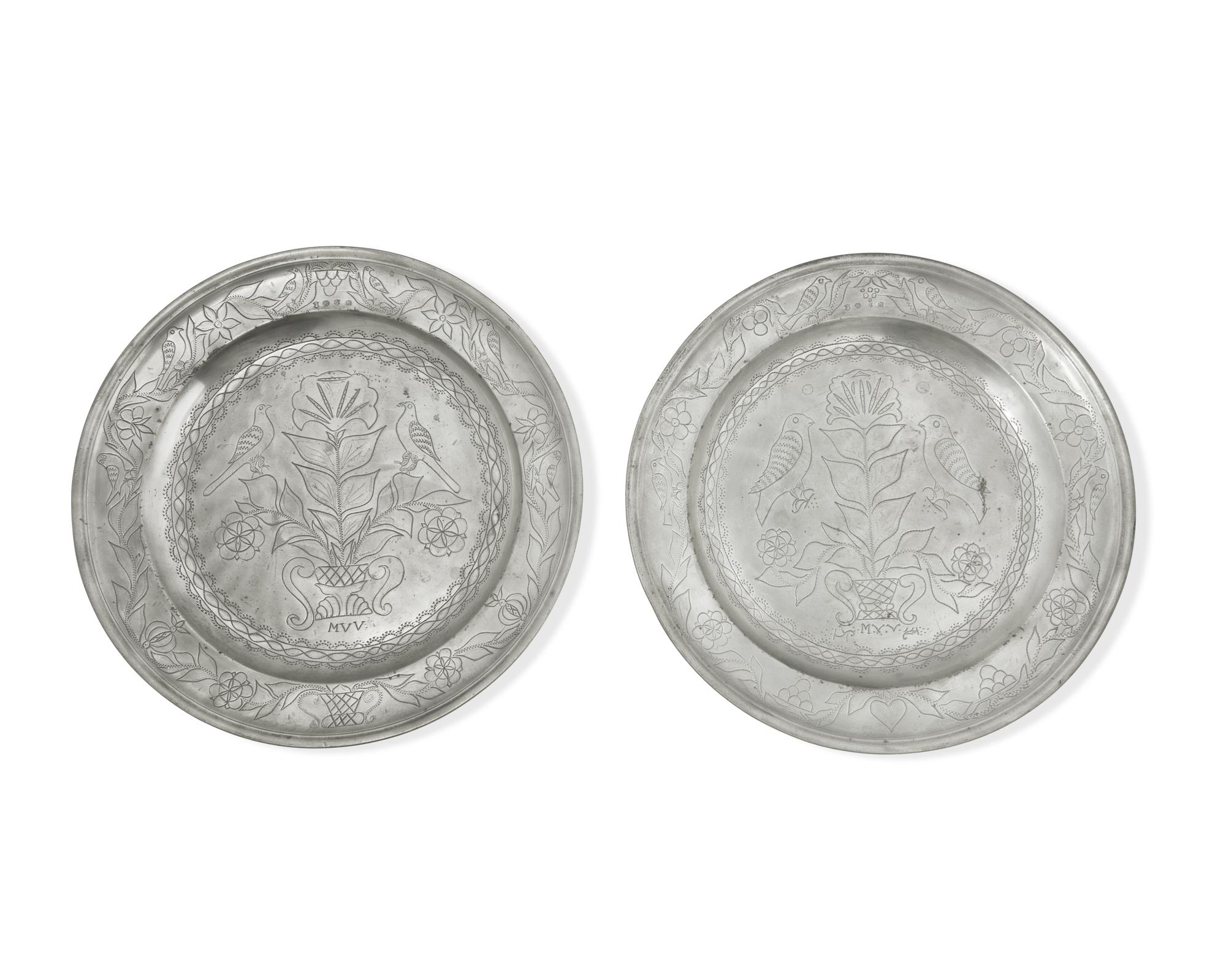 A Matched Pair of French Wriggle-Work Engraved Pewter Chargers, by M. Chocquell, Bergues, France, Circa 1750