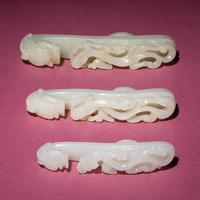 Three Chinese Jade 'Dragon' Belt Hooks, Daigou, 18th/19th Century — 清中期 玉龍鈎三枚