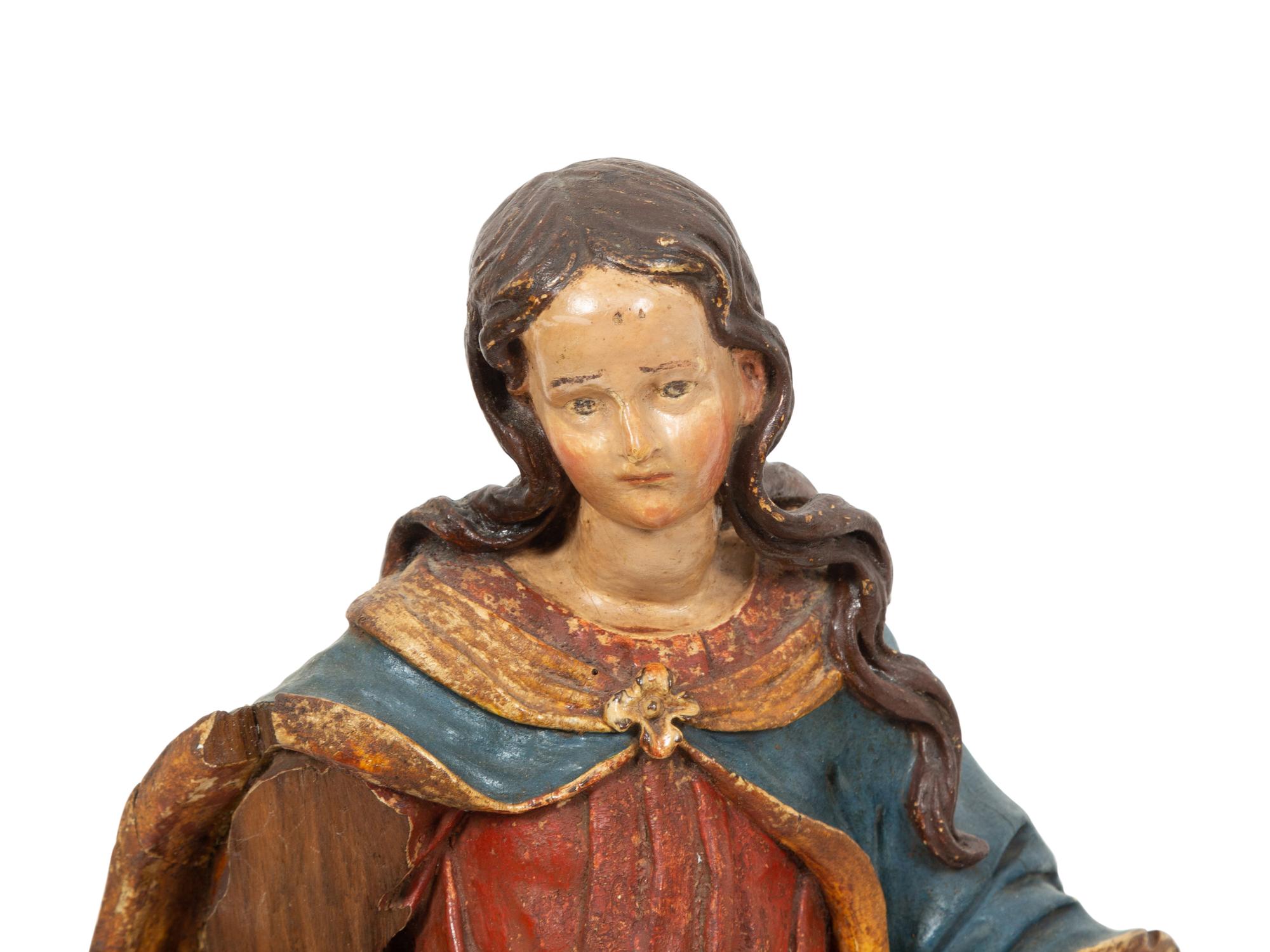 Two Italian Polychromed and Gilt Santos Figures