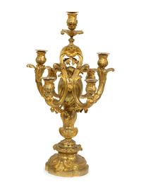 A Louis XV Style Gilt Bronze Clock Garniture