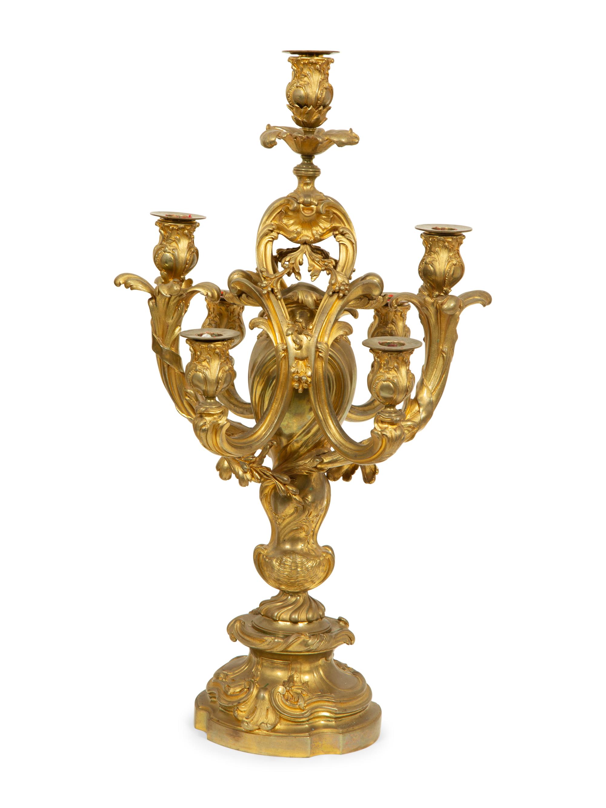 A Louis XV Style Gilt Bronze Clock Garniture