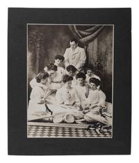 [EARLY PHOTOGRAPHY] -- [SPORTS]. A group of 2 photographs of teams, incl. women's drill team, Baker City, Oregon, and Bowdoin College football team, Brunswick, Maine.