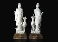 A pair of Chinese Blanc de Chine Figures of Meiren with Deer, Xu Yunlin Zhi impressed mark 德化窯仕女仙鹿瓷塑一對 許雲林製款