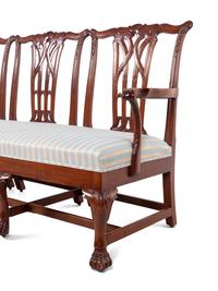A George III Style Carved Mahogany Triple-Back Settee