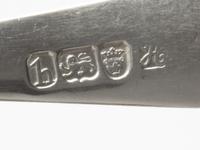 A Pair of George III Silver Table Spoons, Hester Bateman, London, 1783, the handles decorated with a griffin's head erased.