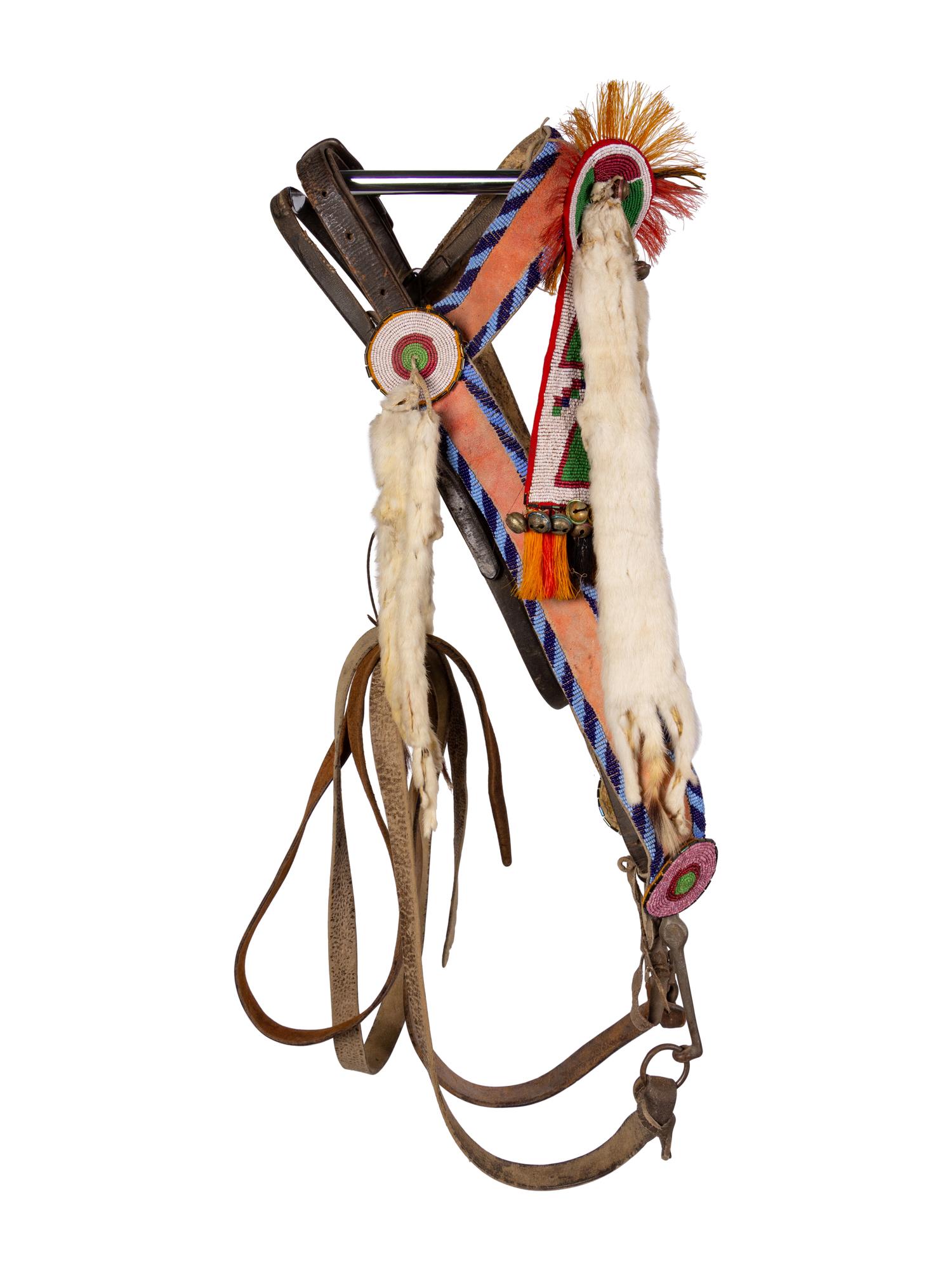 A Group of Western Horse Bridles and Quirts