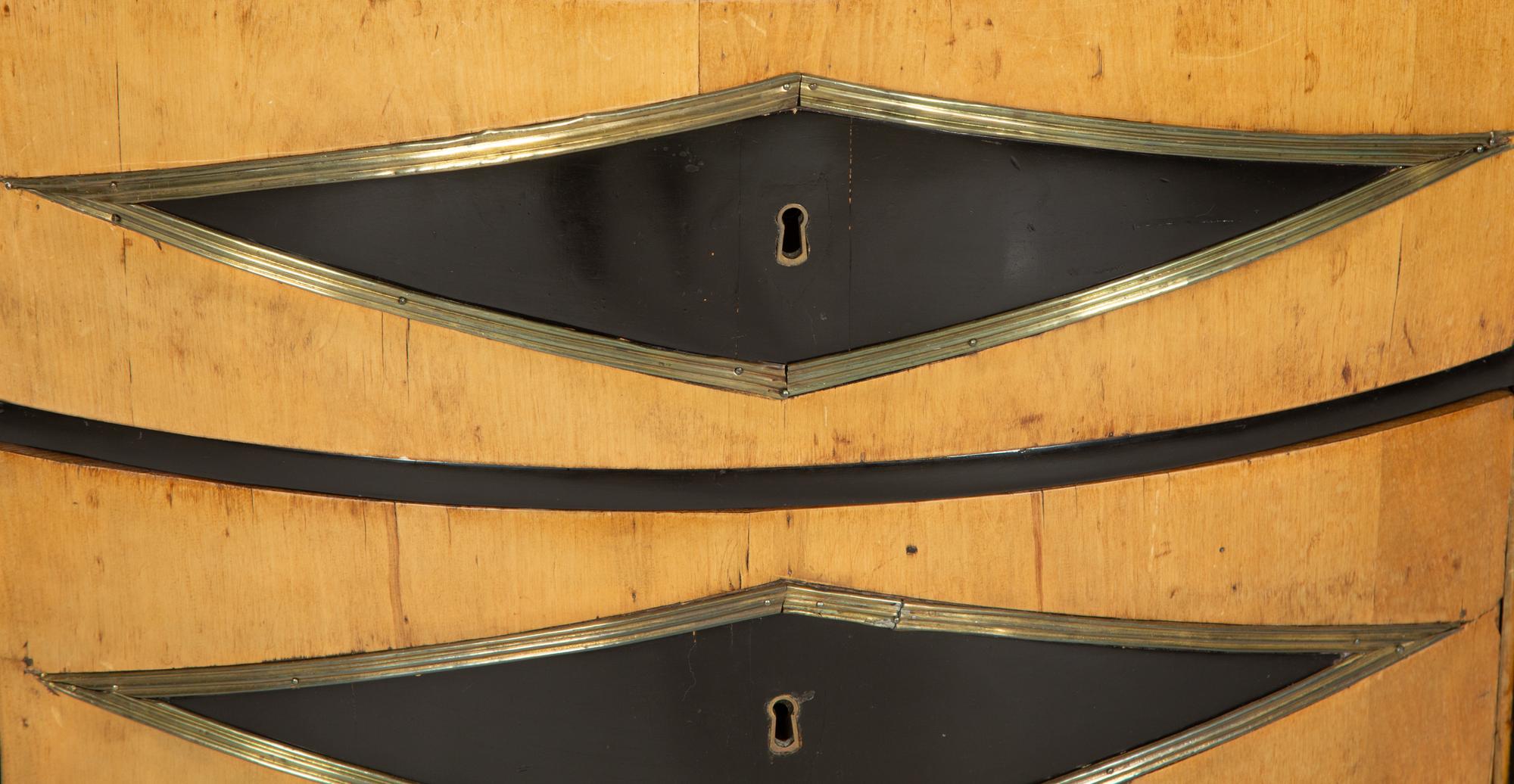 A Russian Neoclassical Part-Ebonized Birch Bowfront Commode