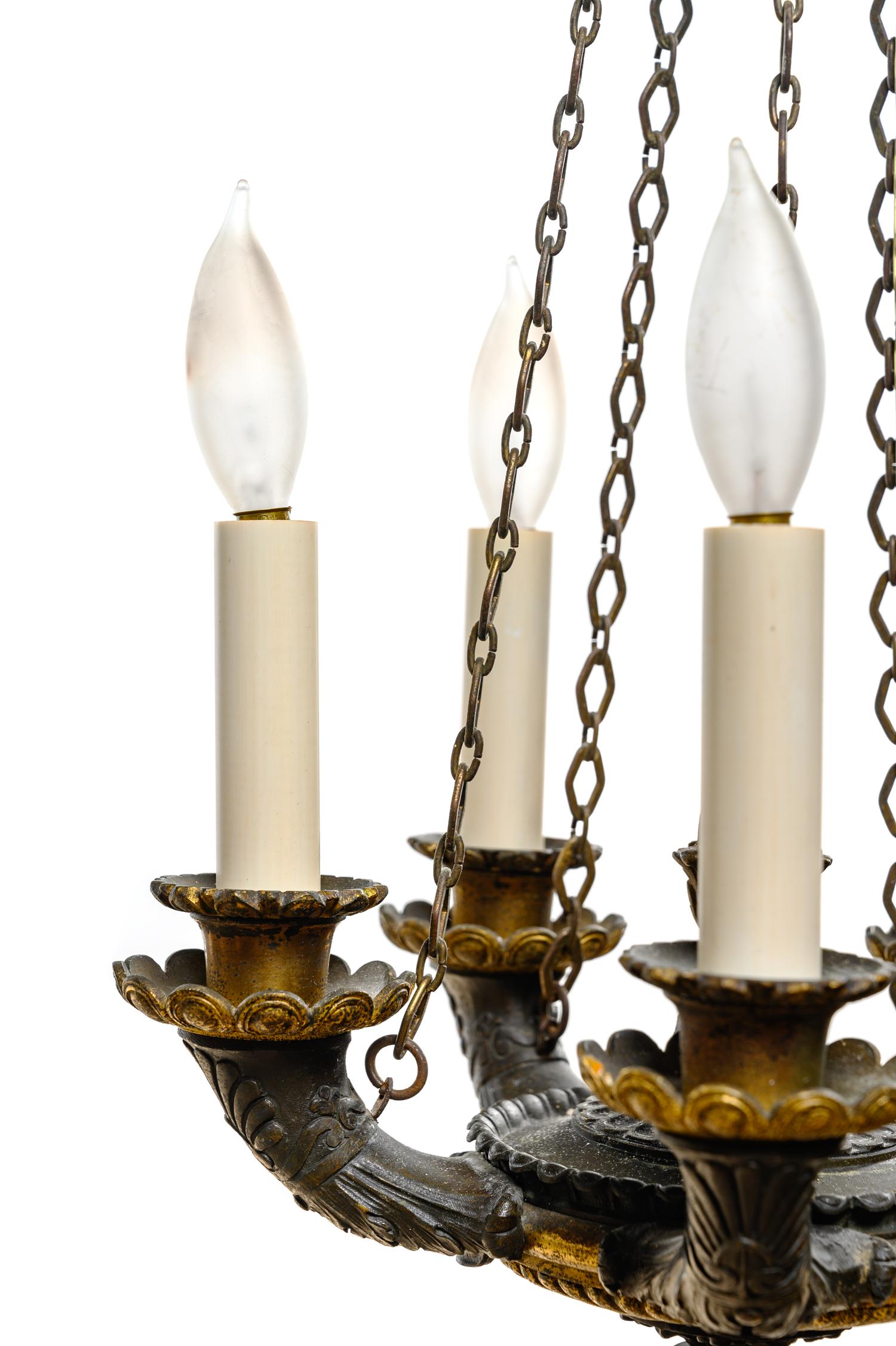 An Empire Style Gilt and Patinated Bronze Five-Light Chandelier