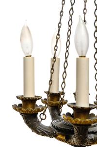 An Empire Style Gilt and Patinated Bronze Five-Light Chandelier
