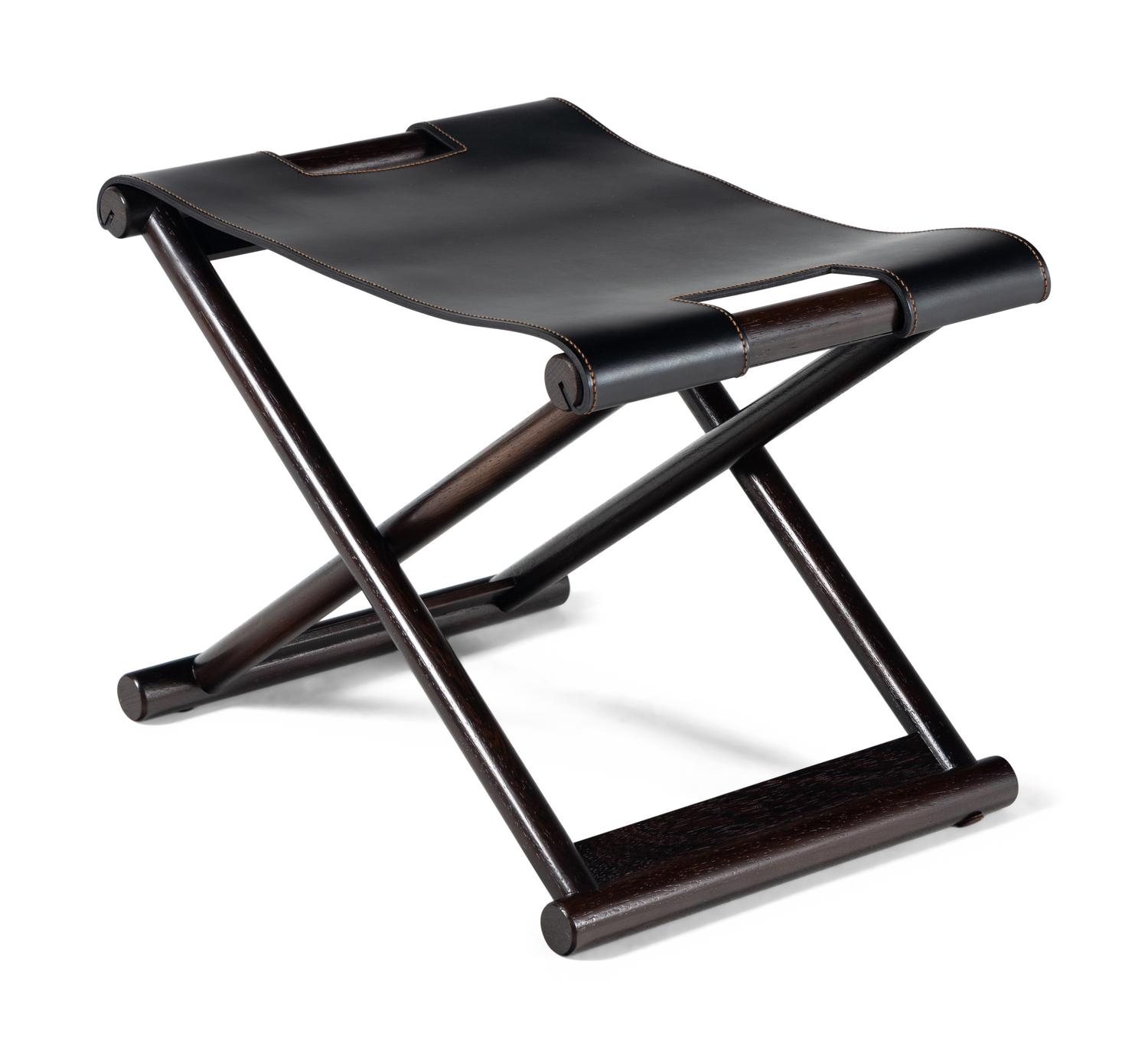 A Contemporary Leather-Upholstered X-Form Stool