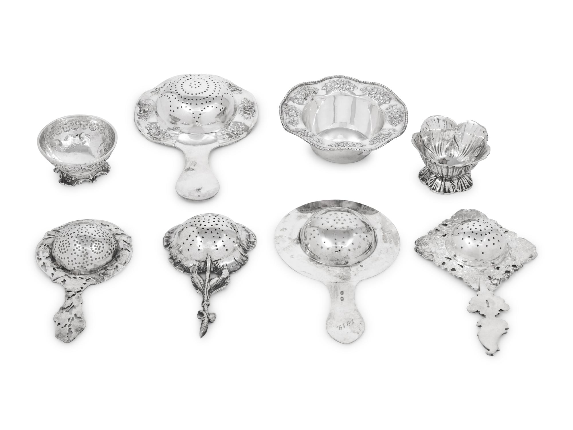 A Group of Five Silver Tea Strainers