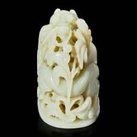 A Chinese pale celadon jade reticulated "Dragon" finial 青白玉镂空龙形炉端