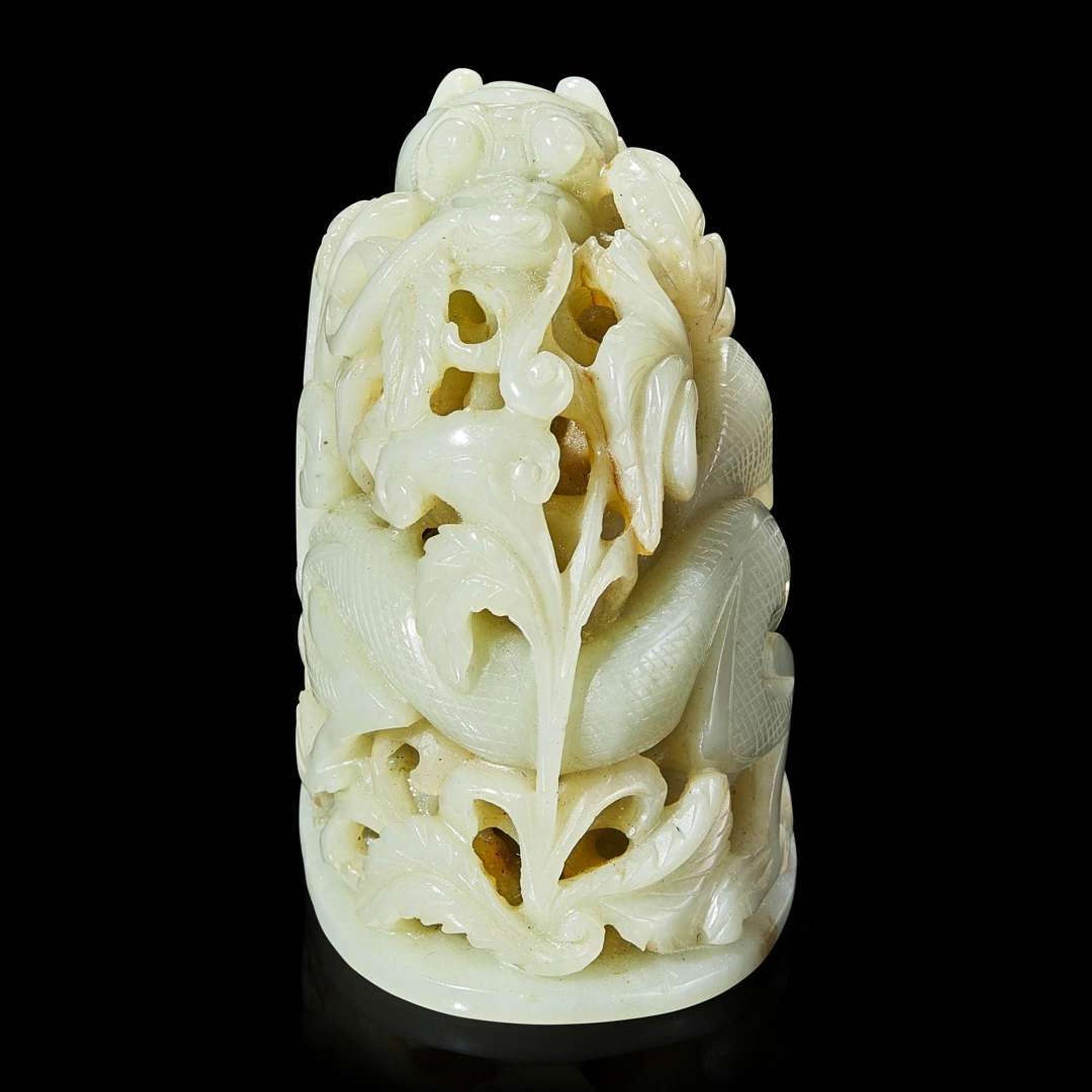 A Chinese pale celadon jade reticulated "Dragon" finial 青白玉镂空龙形炉端