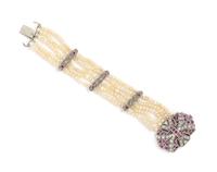 A White Gold, Ruby, Diamond and Seed Pearl Multistrand Bracelet, 13.60 dwts.
