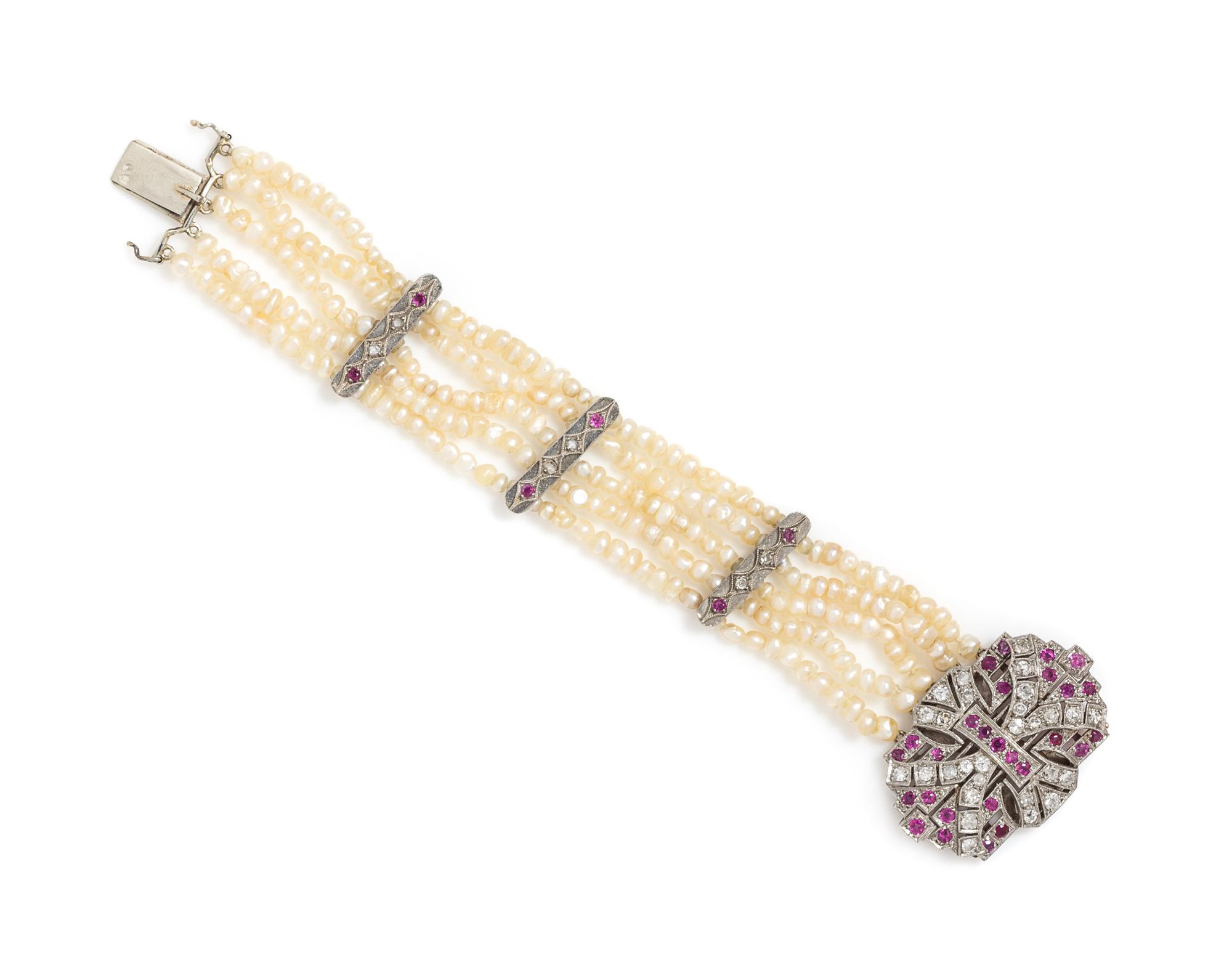 A White Gold, Ruby, Diamond and Seed Pearl Multistrand Bracelet, 13.60 dwts.