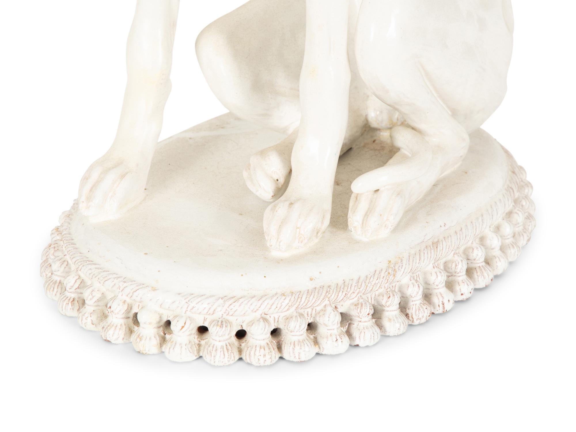 A Glazed Pottery Whippet Sculpture