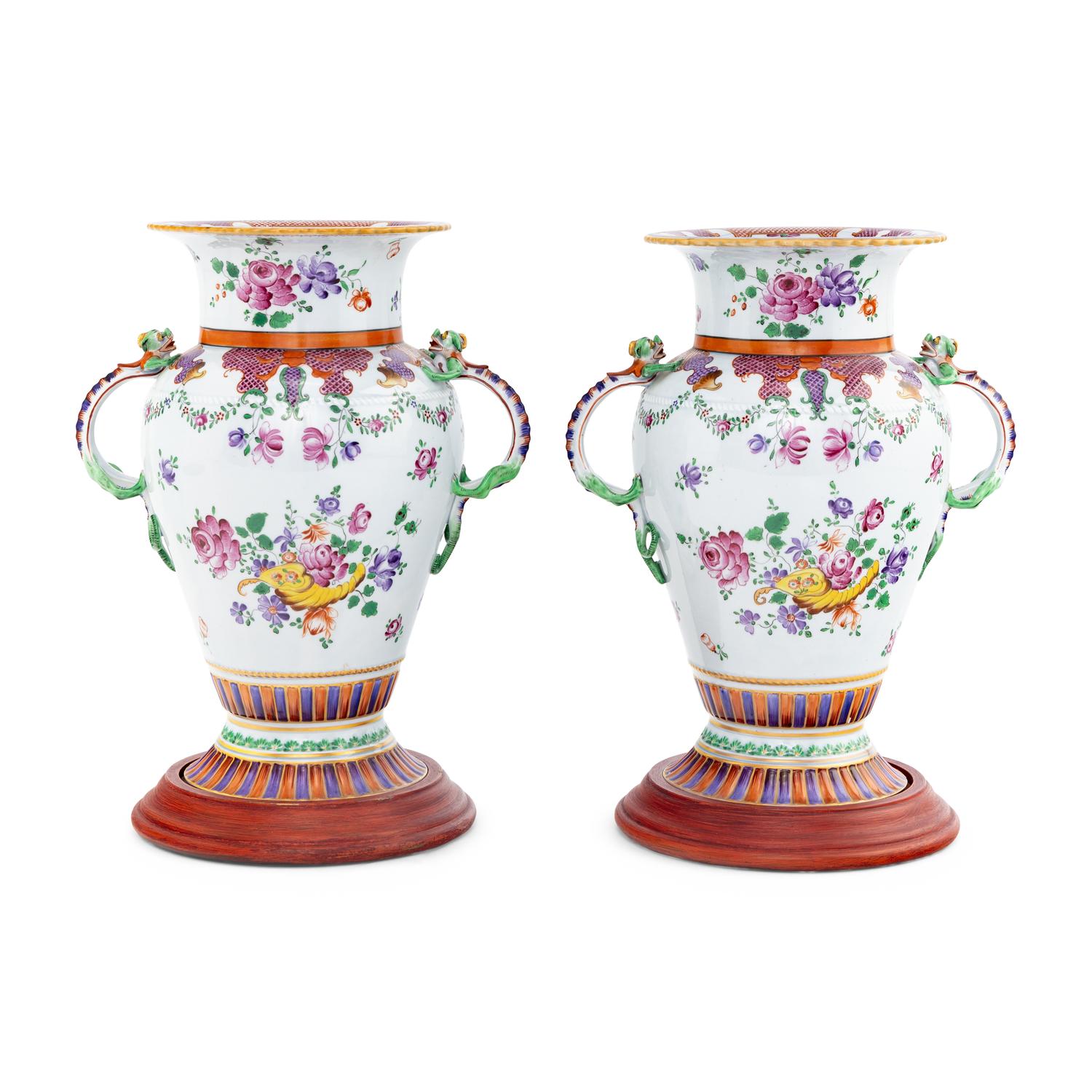 A Pair of Porcelain Urns with Dragon Handles