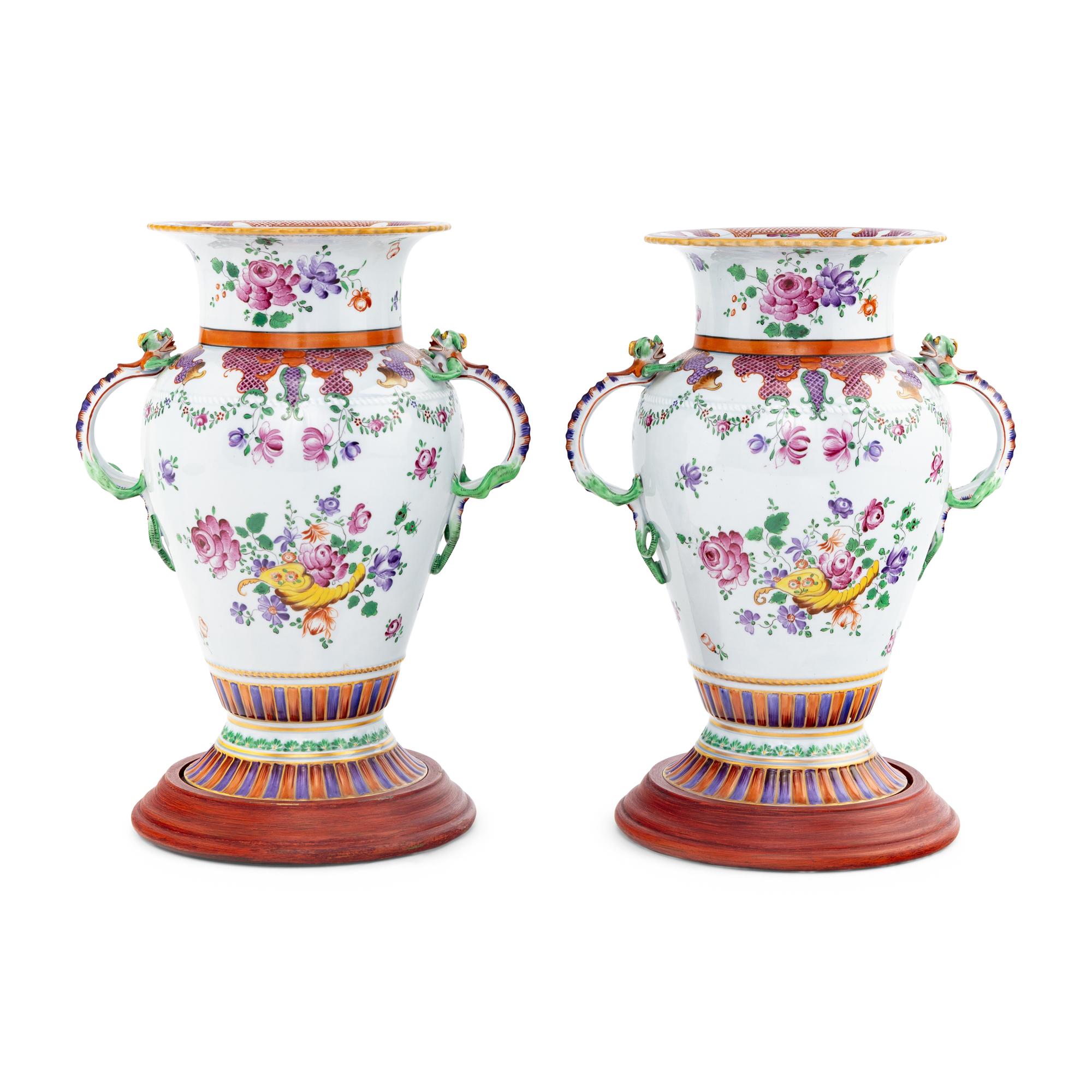 A Pair of Porcelain Urns with Dragon Handles