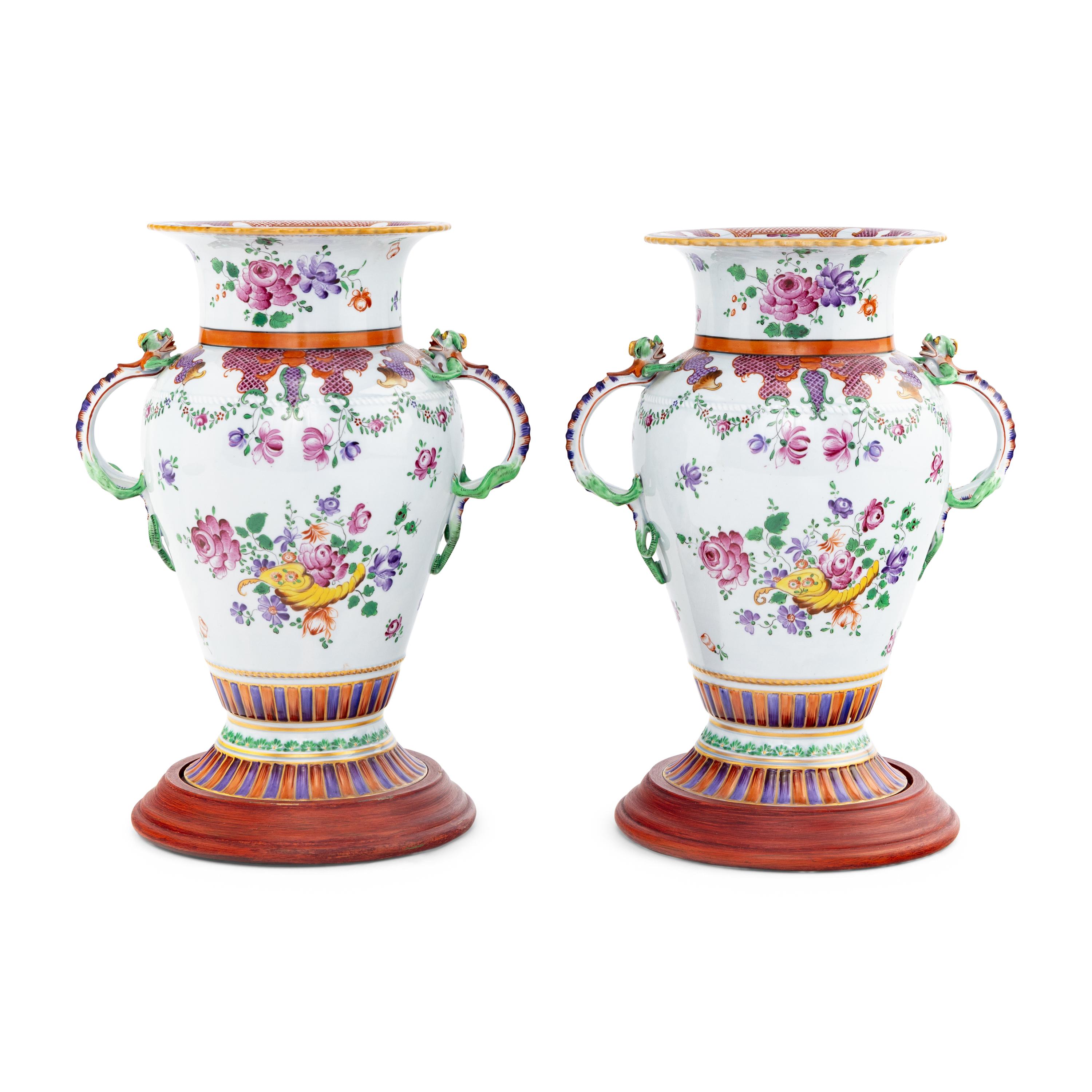 A Pair of Porcelain Urns with Dragon Handles