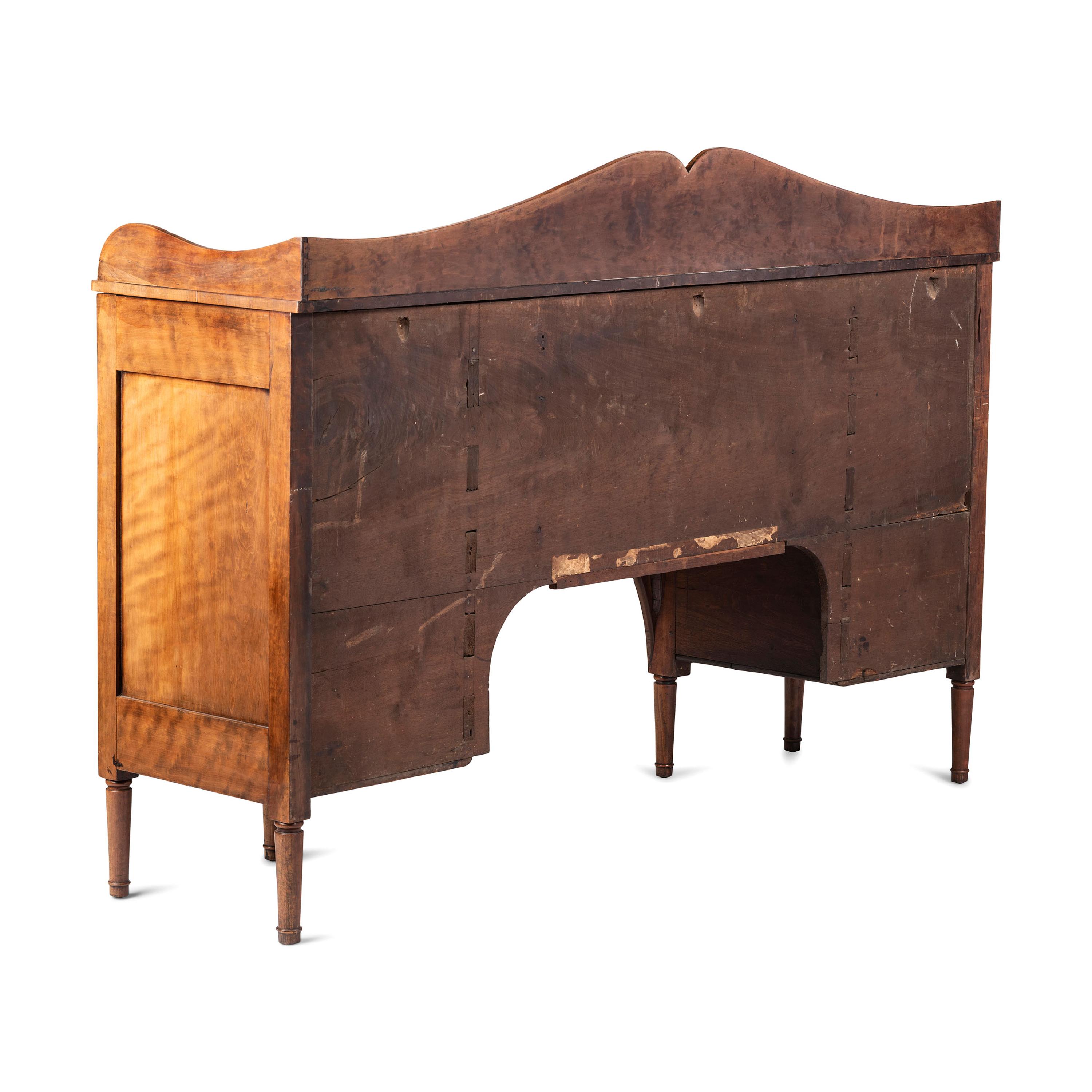 A Classical Highly Figured Cherrywood Scallop-Front Sideboard
