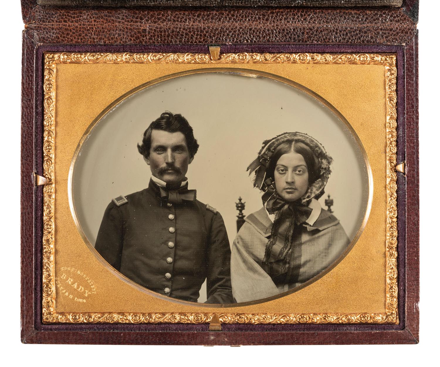[CIVIL WAR]. BRADY, Mathew (1822-1896), photographer. Quarter plate Cutting's Patent double-sided ambrotype of a pre-war first lieutenant and his female companion.