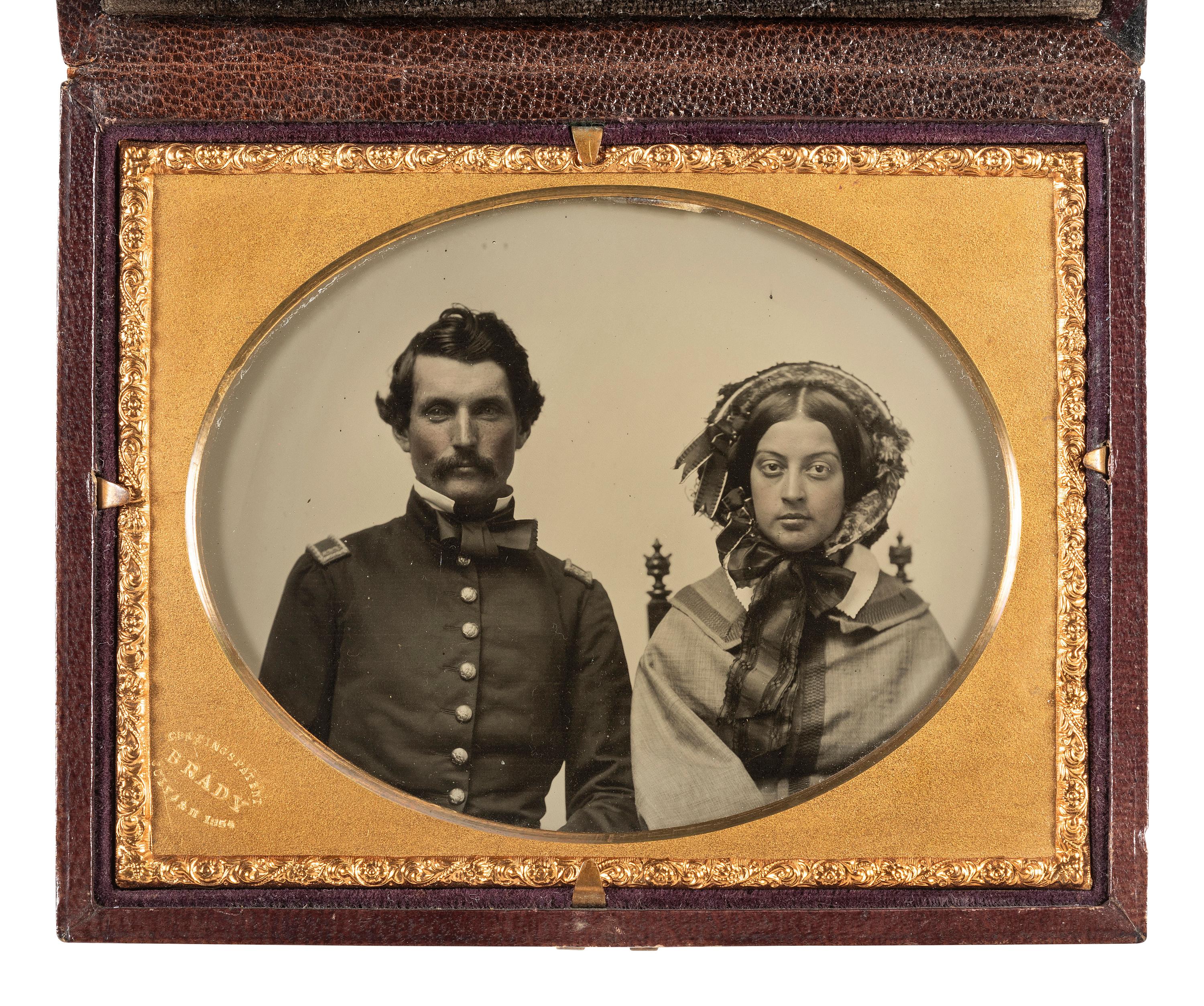 [CIVIL WAR]. BRADY, Mathew (1822-1896), photographer. Quarter plate Cutting's Patent double-sided ambrotype of a pre-war first lieutenant and his female companion.