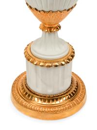 A Pair of Gilt Metal Mounted Bisque Porcelain Lamps