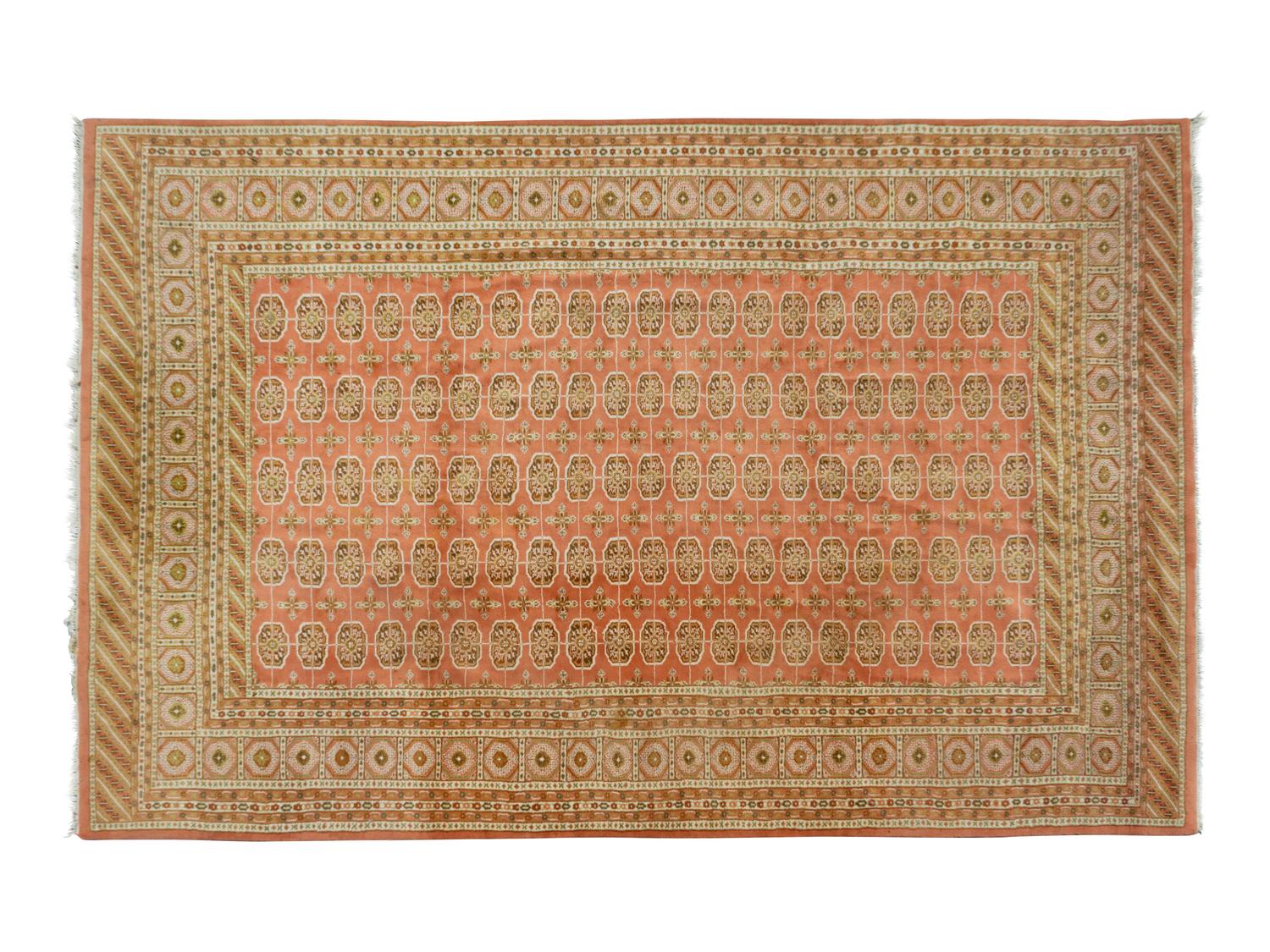 A Pakistani Bokhara Wool Rug — 20TH CENTURY