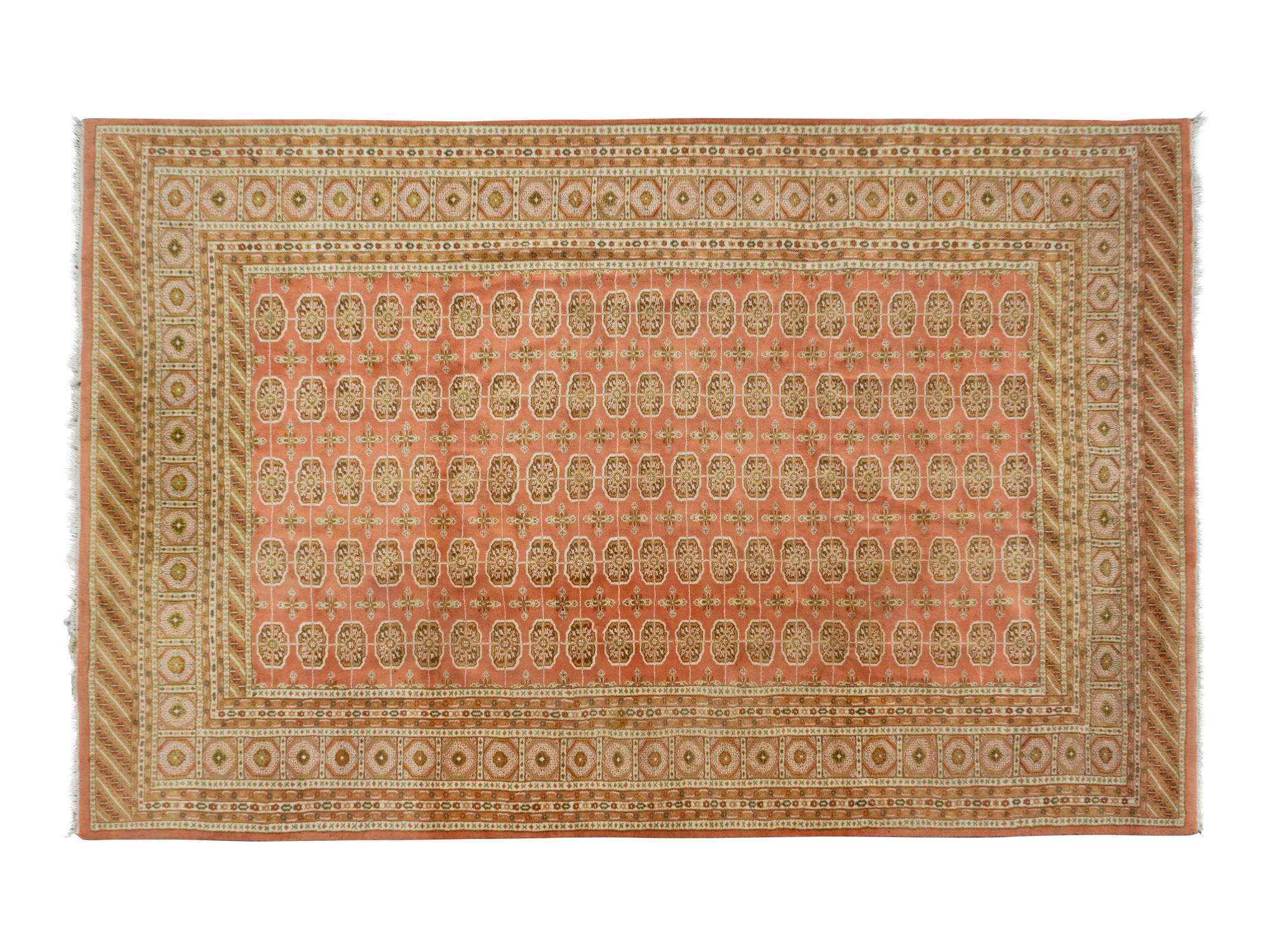 A Pakistani Bokhara Wool Rug — 20TH CENTURY