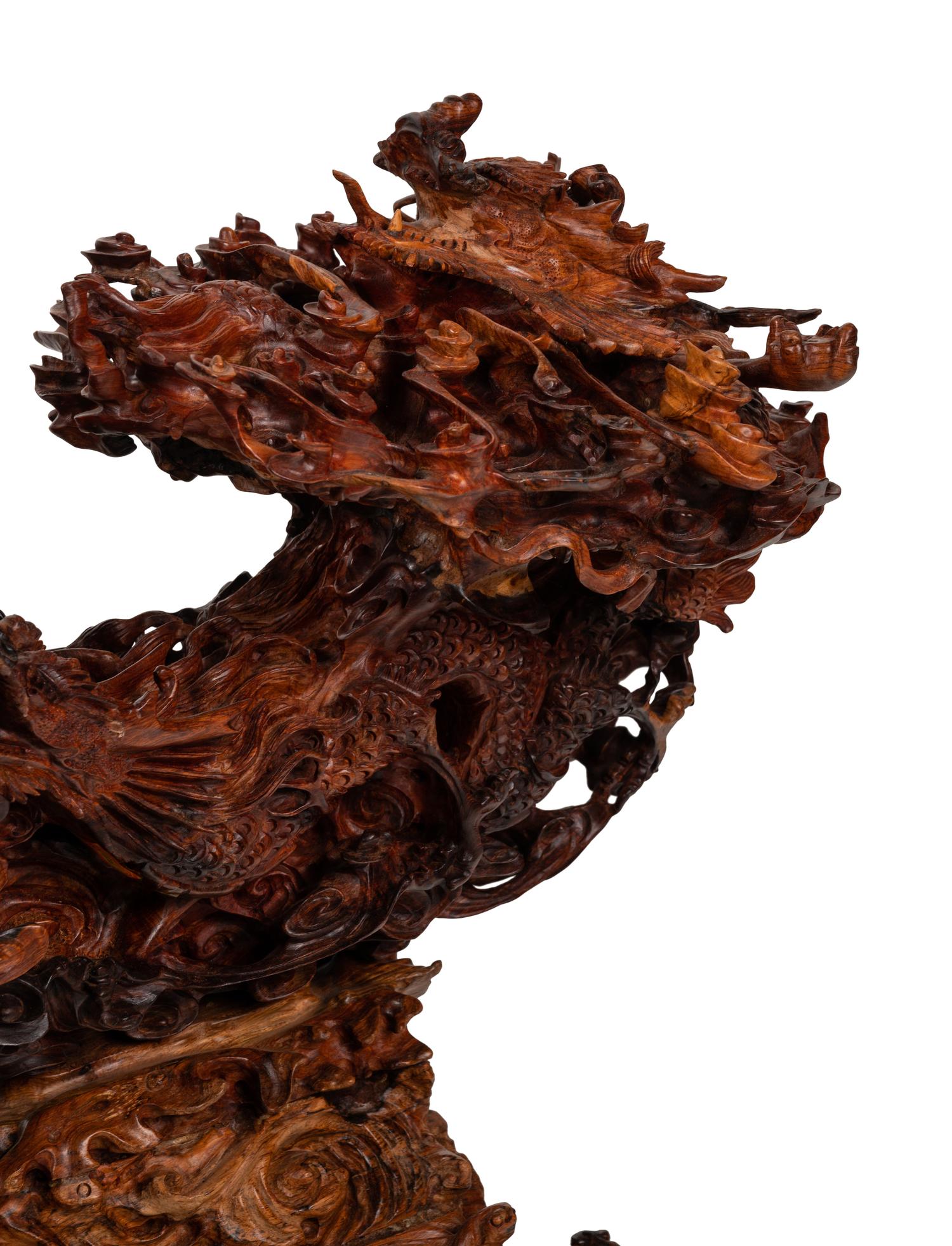 A Large Chinese Carved Rosewood or Mahogany Sculpture