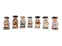 A Collection of Seven Ceramic Toby Mugs