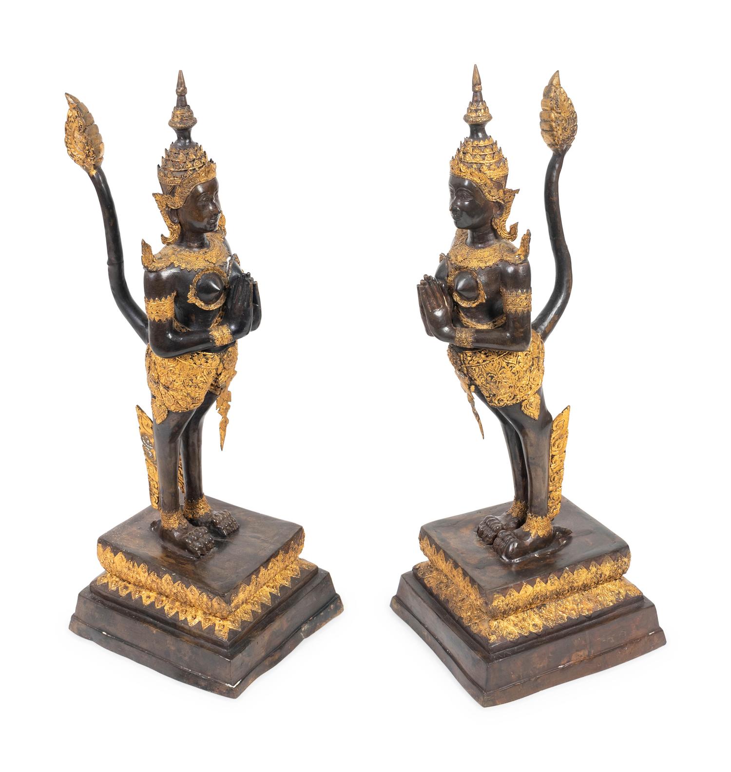 A Pair of Thai Parcel Gilt and Patinated Bronze Mythical Figures