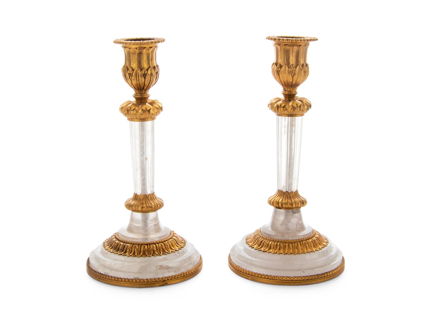A Pair of French Gilt Bronze and Rock Crystal Candlesticks