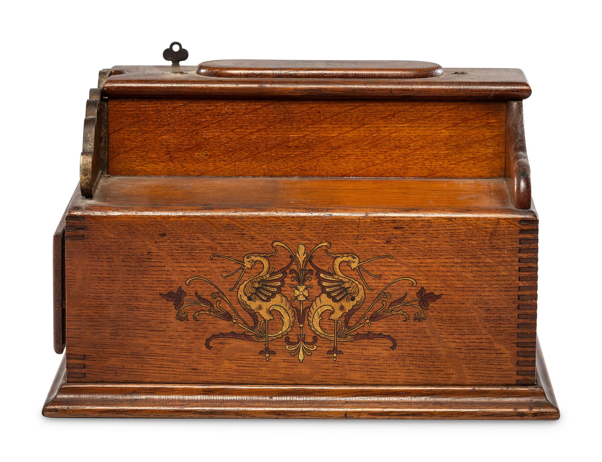 A Monitor Paint Decorated Oak and Cast Iron Coin-Operated Barbershop Cash Register