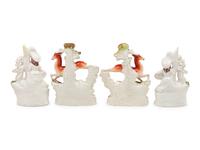 Two Pairs of Staffordshire Figural Groups