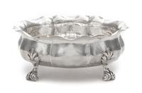 An Italian Silver Bowl, Buccellati, 20th Century, having a flared rim and an undulating body and raised on four foliate scroll decorate