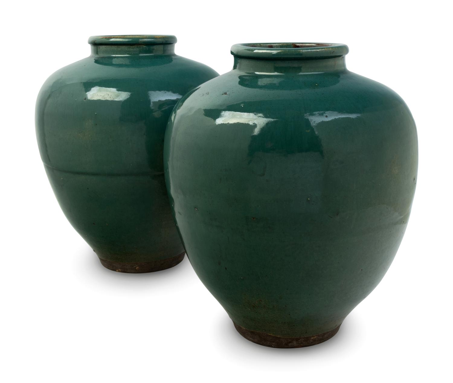 A Pair of Green Glazed Porcelain Vases