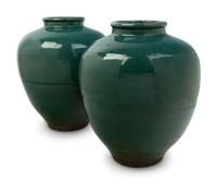 A Pair of Green Glazed Porcelain Vases