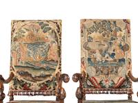 A Pair of William and Mary Style Walnut Armchairs with Flemish Tapestry Upholstery