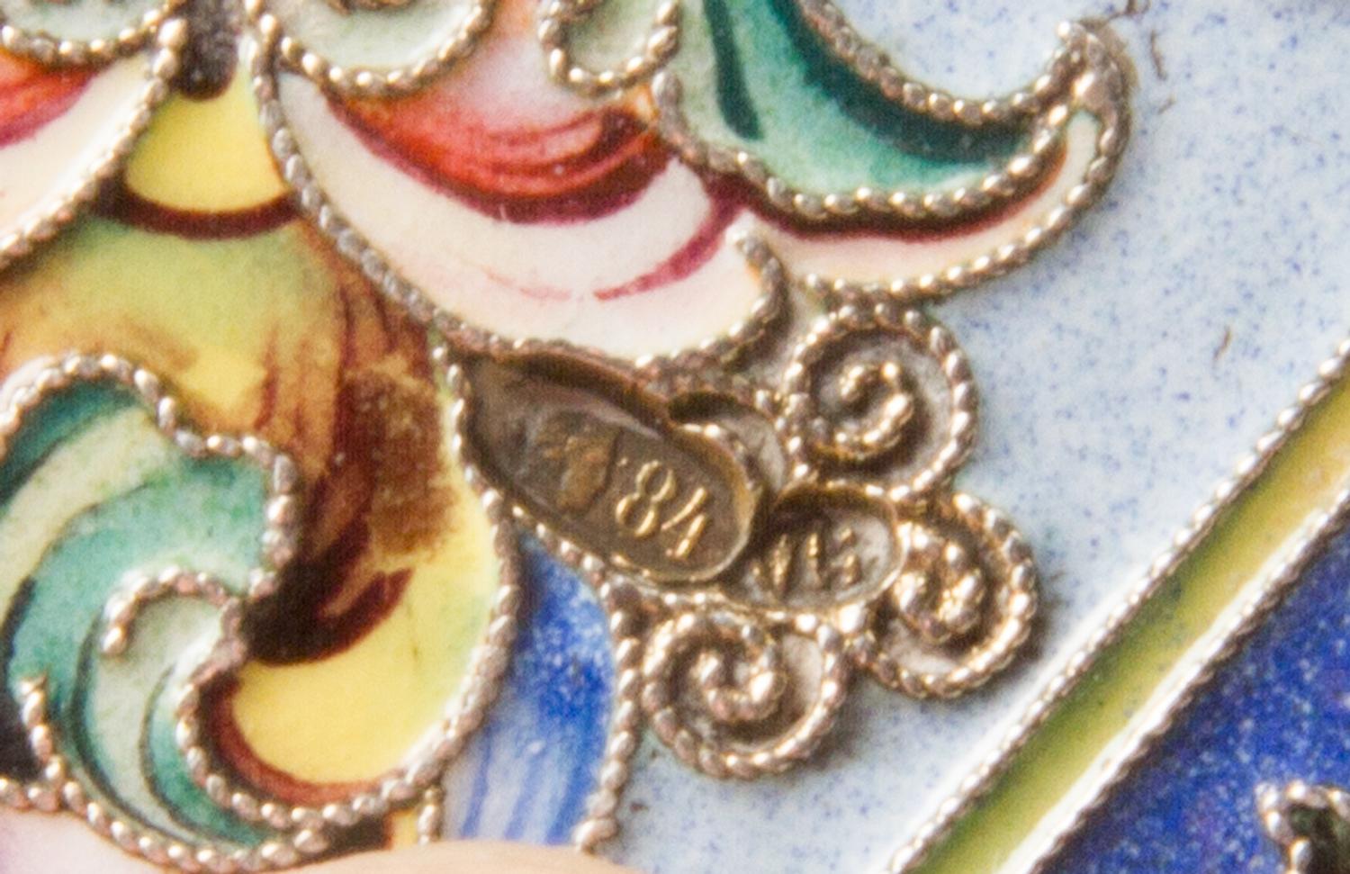 A Russian Enameled Silver Cigarette Case, Maker's mark Cyrillic IA, Moscow, early 20th century, the lid and underside decorated with fl
