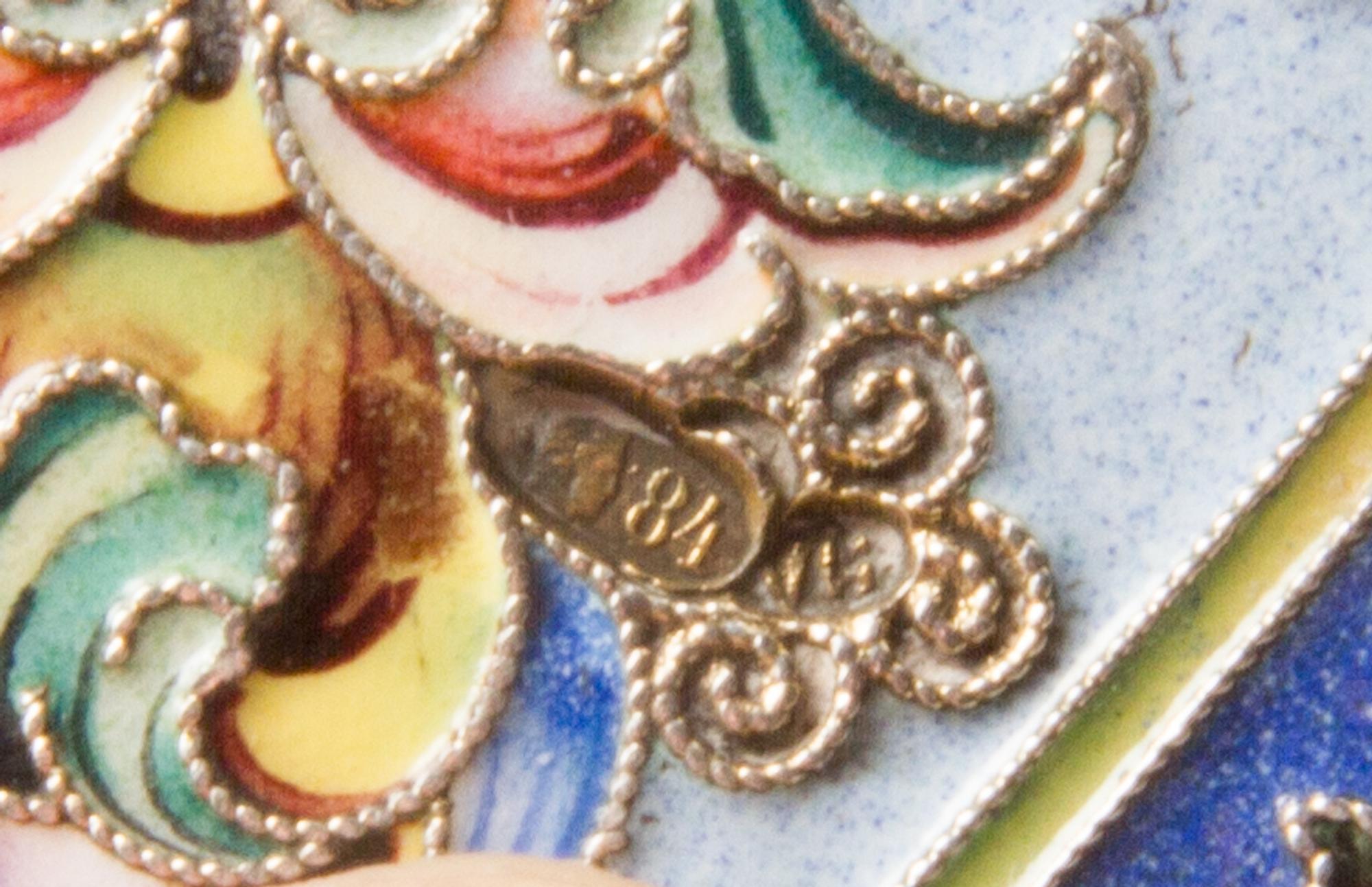 A Russian Enameled Silver Cigarette Case, Maker's mark Cyrillic IA, Moscow, early 20th century, the lid and underside decorated with fl