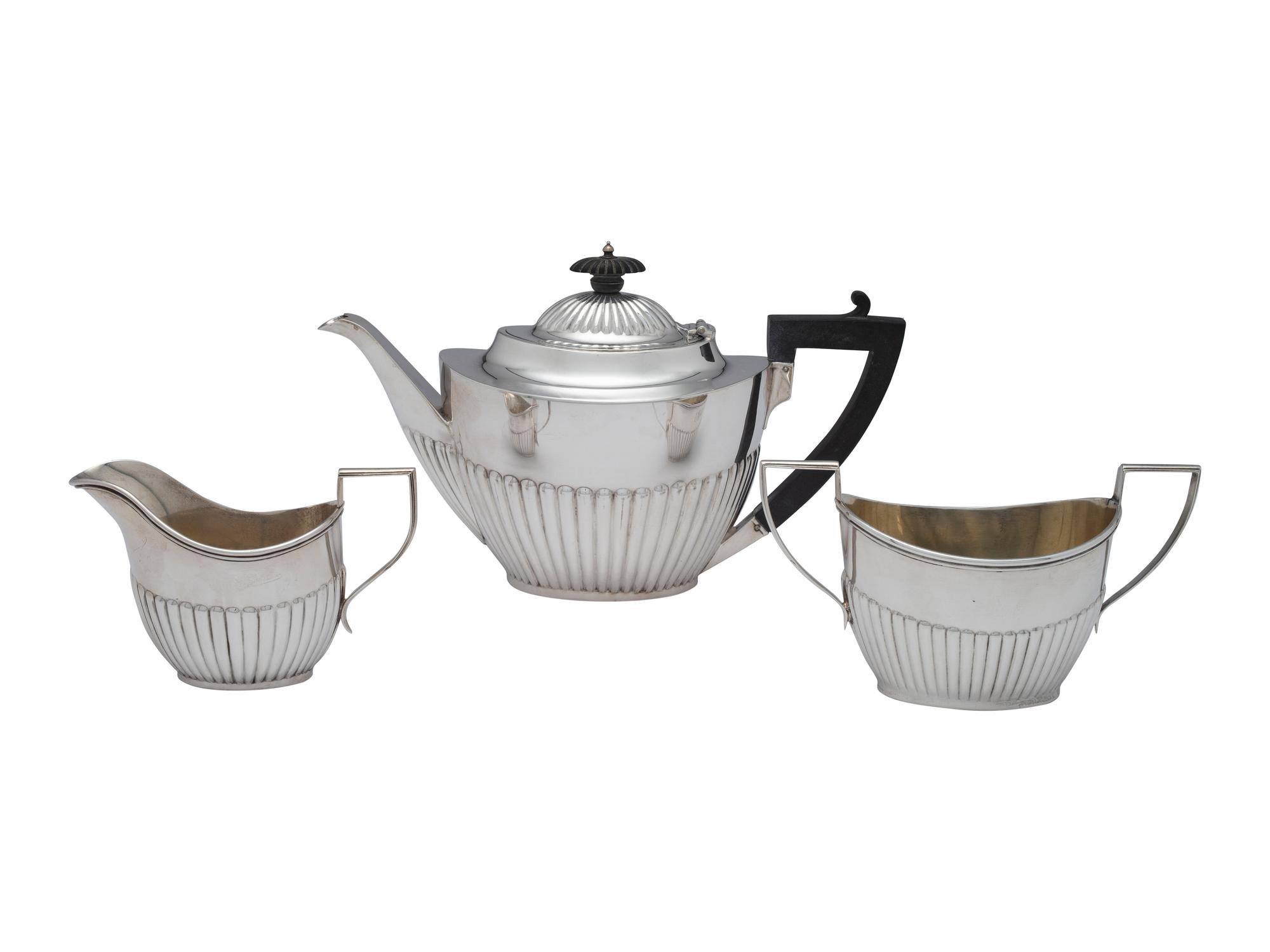 A Three-Piece Silver Tea Service
